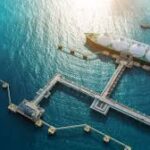 Aerial view of LNG ship at terminal.